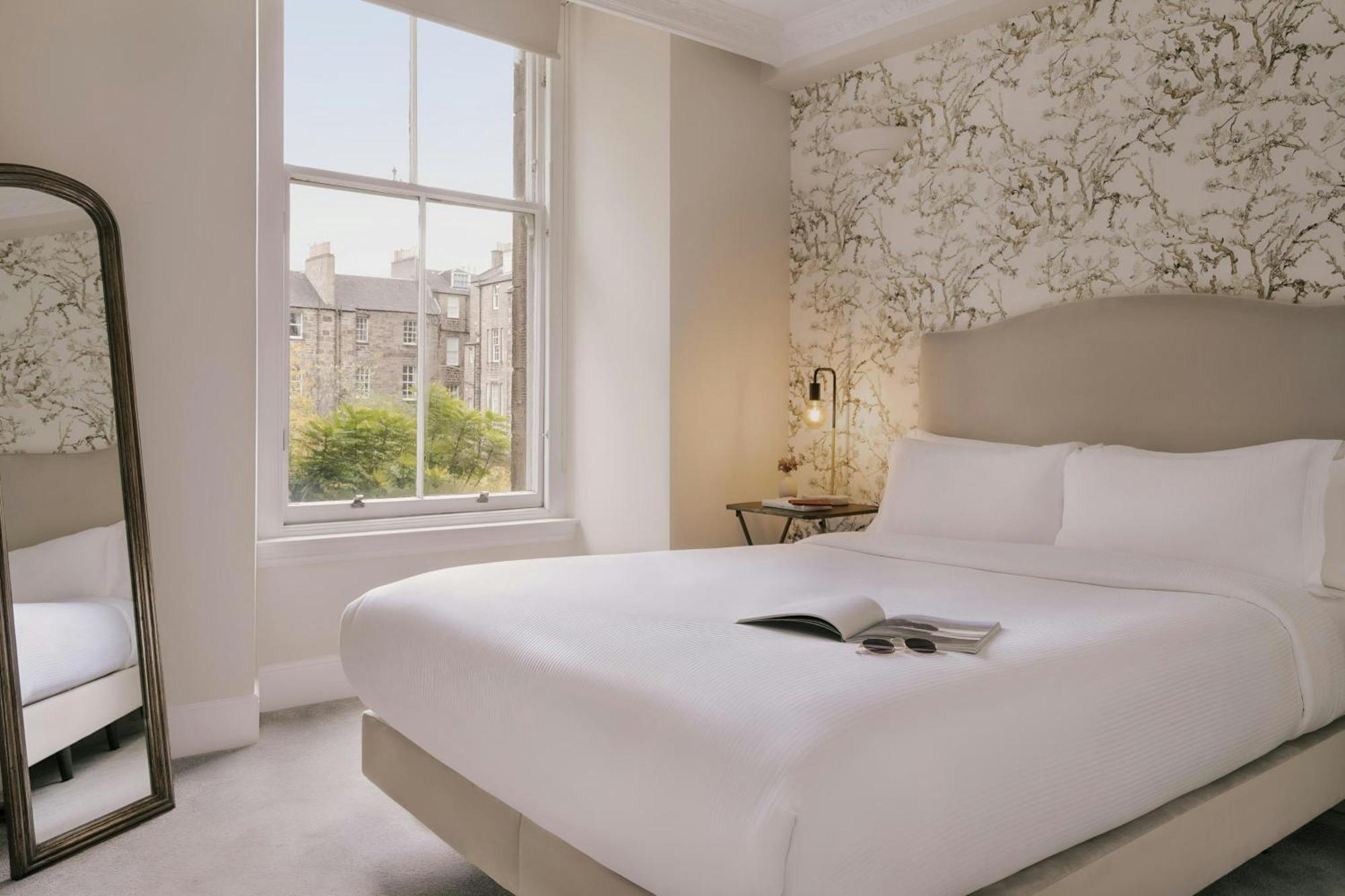 Suite de 1 dormitorio con vistas al jardín